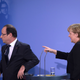 Angela Merkel shows François Hollande the exit as they leave the Federal Chancellery.